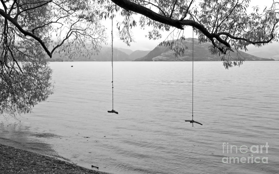 Empty Swings in the Rain Photograph by Carole Lloyd