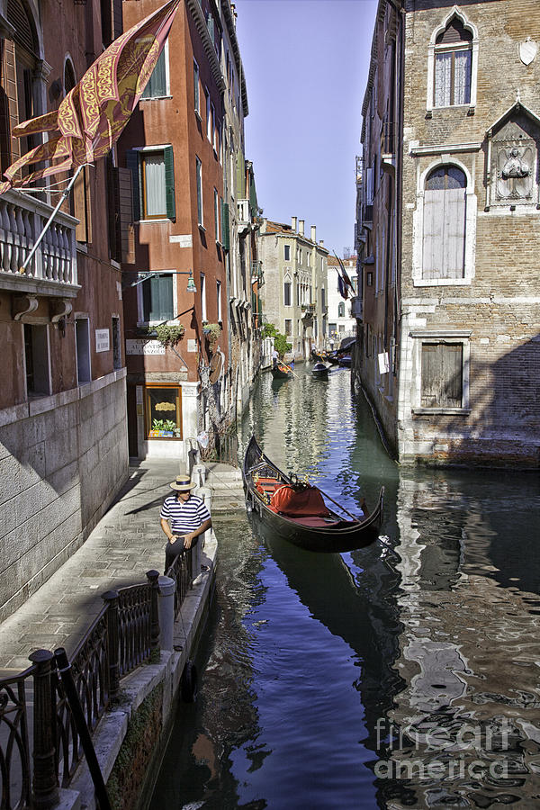 Even a gondolier has to take a break Photograph by Madeline Ellis