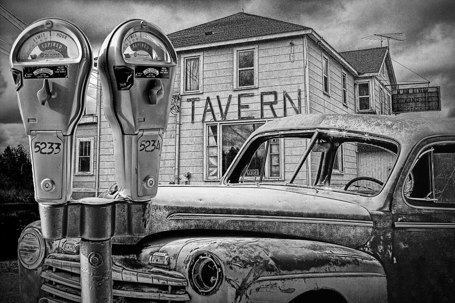 Expired a Black and White Photograph of a Tavern Parking Meters and Vintage Junk Auto Photograph by Randall Nyhof