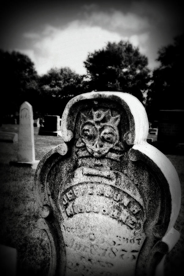 Face In The Grave Photograph by Lora Mercado