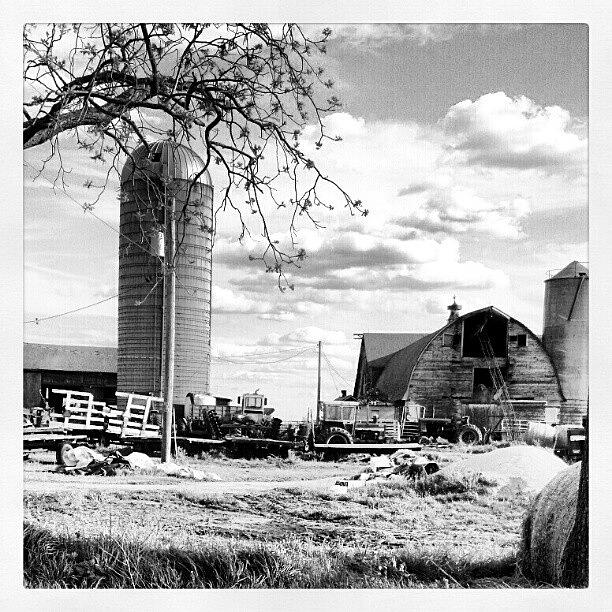 Spring Photograph - #farm #barn #tractor #cloud by Bryan P