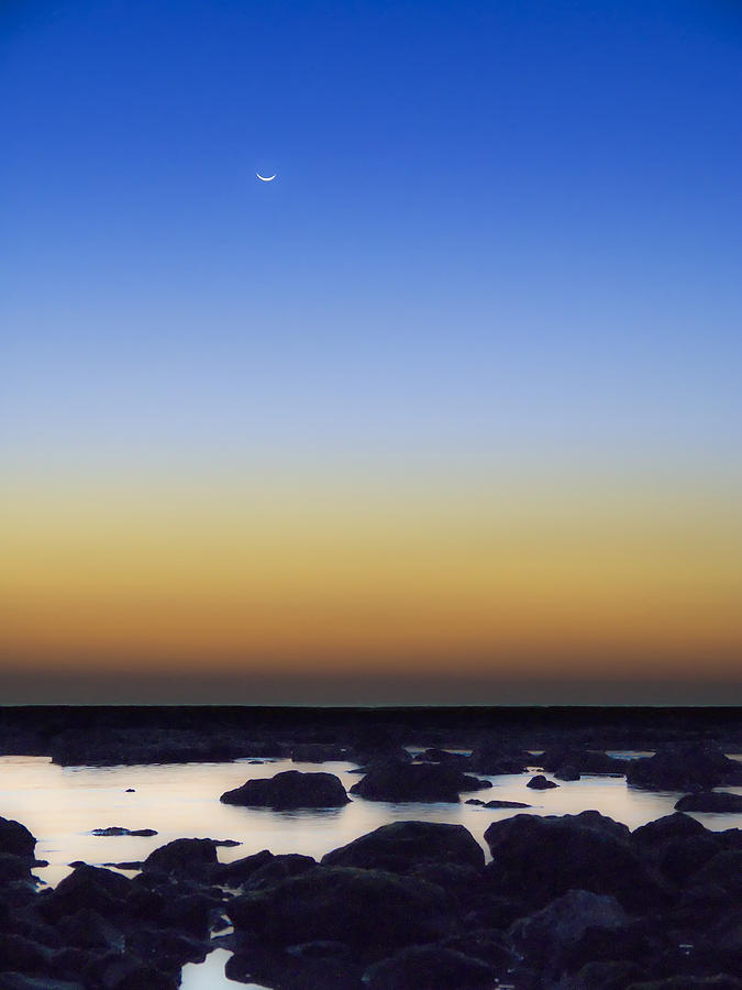 Sunset Photograph - February New Moon by Meir Ezrachi