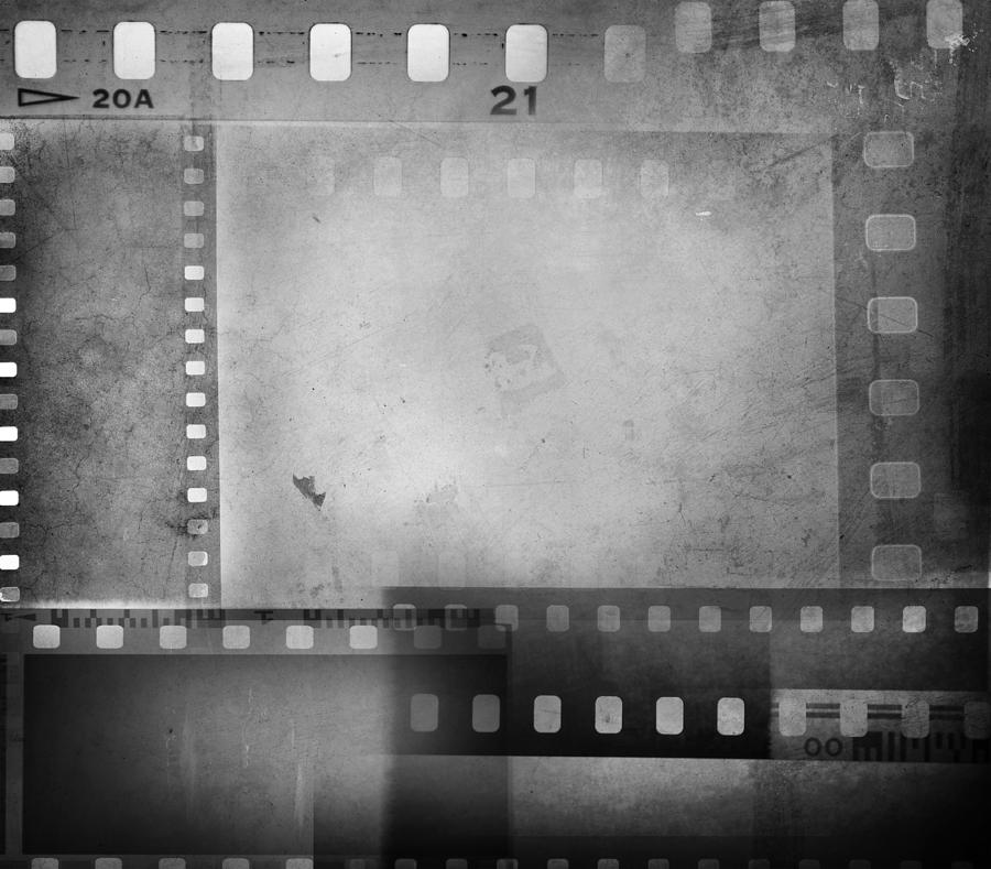 Black And White Photograph - Film negatives  by Les Cunliffe