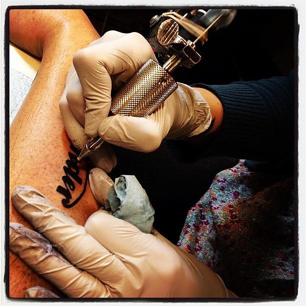 Tattoo Photograph - Finishing The Last Bit Of My New by Kevin Smith