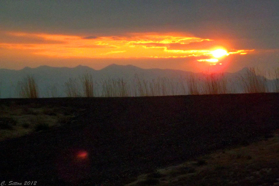 Fireball Sunrise Photograph by C Sitton