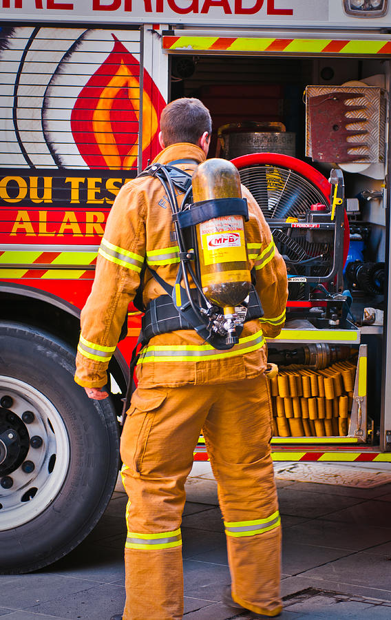 Firefighter Ready For Action Photograph by Paul Donohoe