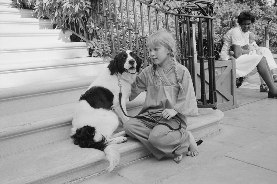 Dog Photograph - First Daughter Amy Carter With Her Dog by Everett