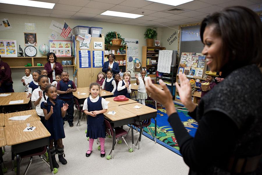 History Photograph - First Lady Michelle Obama Claps by Everett
