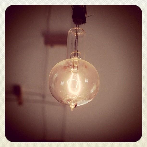 Light Photograph - First Light Bulb by Tony Yu