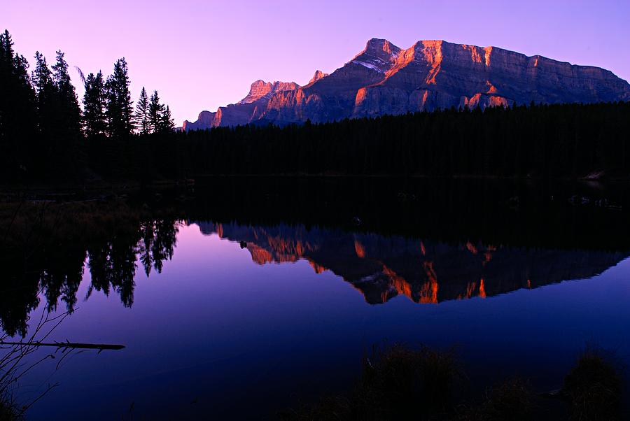 First Light on Mount Rundle Photograph by Larry Ricker