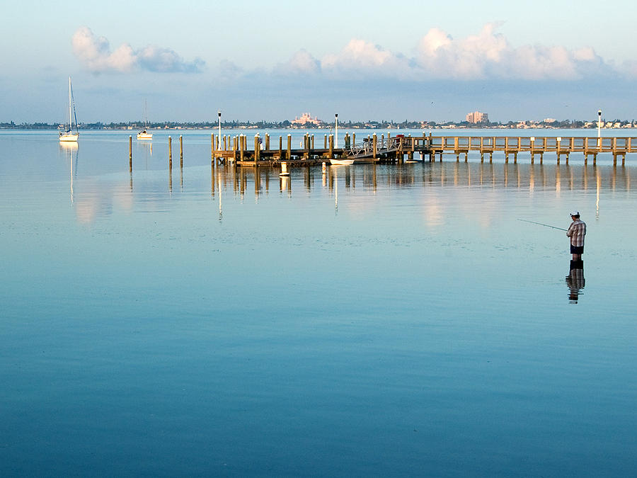 Fisherman on Boca Ciega Bay in Gulfport Florida Photograph by Rob ...