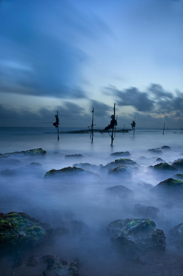 Fishermen at blue hour Photograph by Ng Hock How