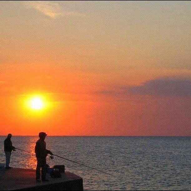 Sunset Photograph - Fishermen at sunset by Gianluca Sommella