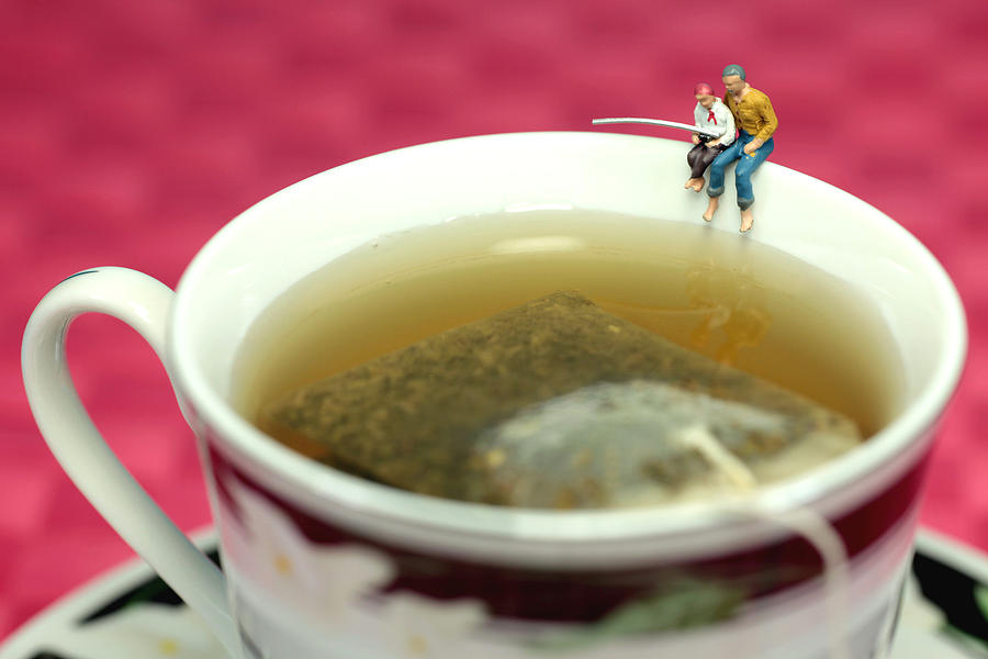Fishing at the edge of a cup of tea Photograph by Paul Ge
