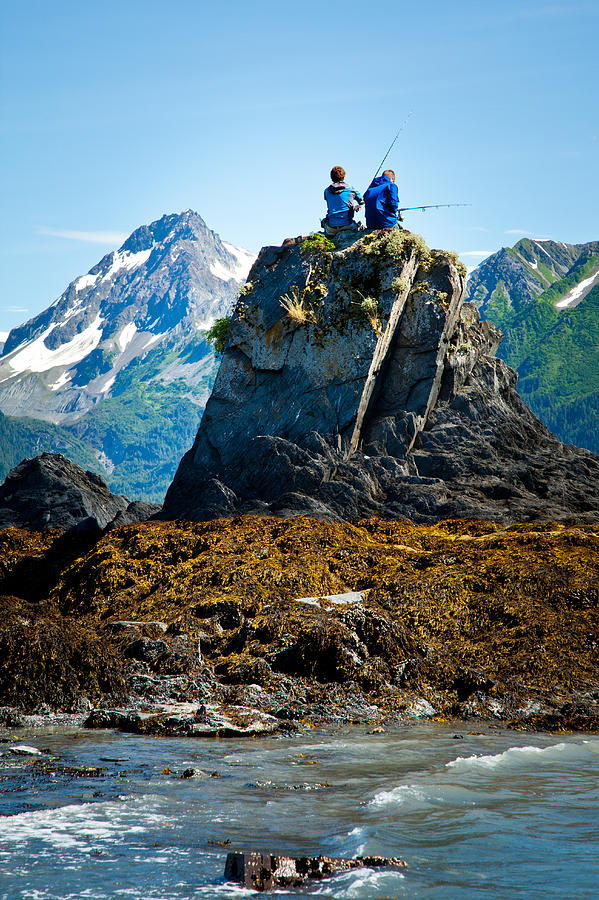 Mountain Photograph - Fishing from the Rock by Adam Pender