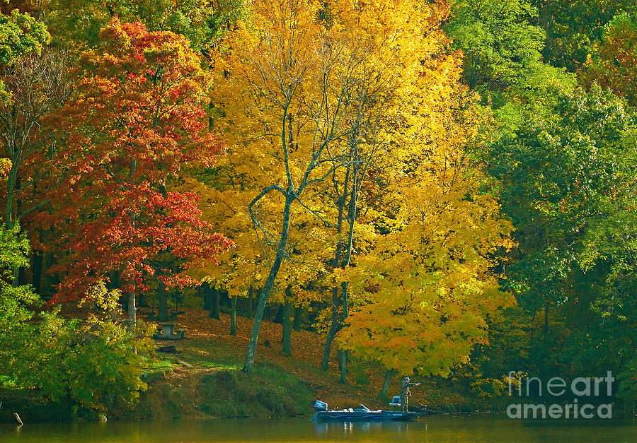Fishing in Autumn Photograph by Anne Kitzman