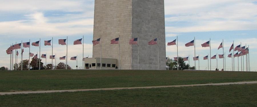 Flags around the Washington Monument Photograph by Keith Stokes