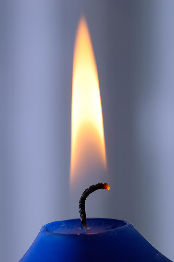 Christmas Photograph - Flame of a burning candle by Matthias Hauser