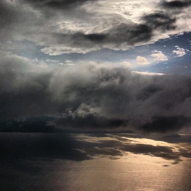 Clouds Photograph - Flight by Spyros Papaspyropoulos