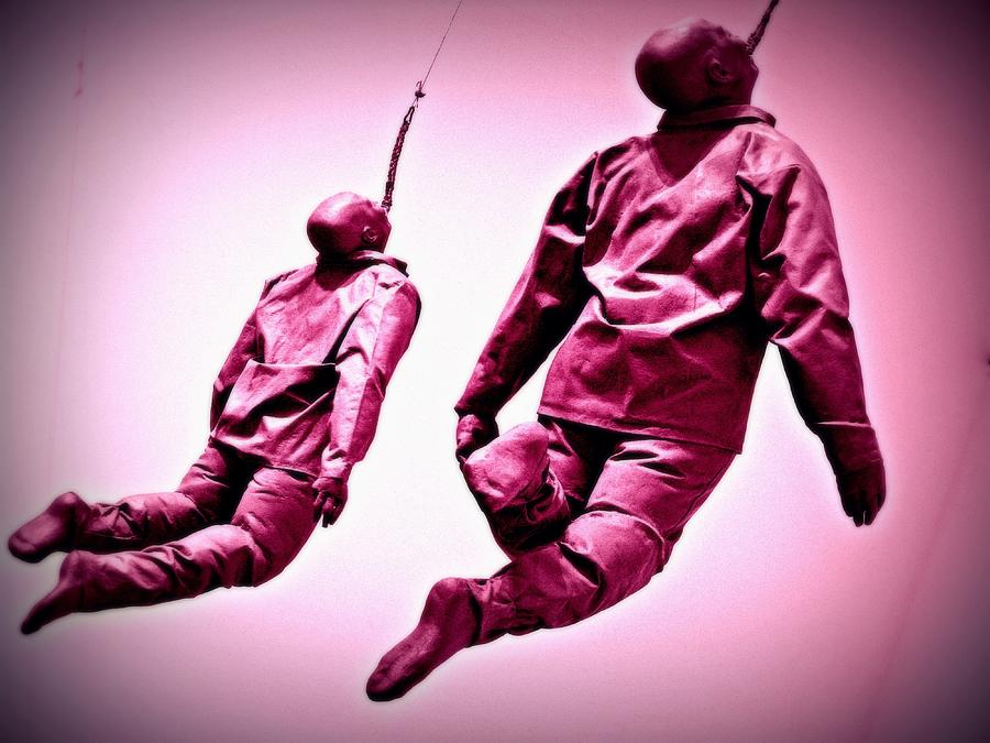 Floating Men Photograph by Photo Proyectolabs