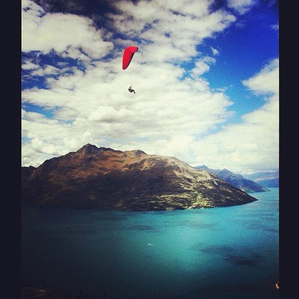 Mountain Photograph - Floating over Queenstown by Georgia Rose