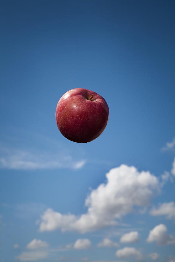 Flying Apple In The Sky Photograph by Hiroshi Watanabe