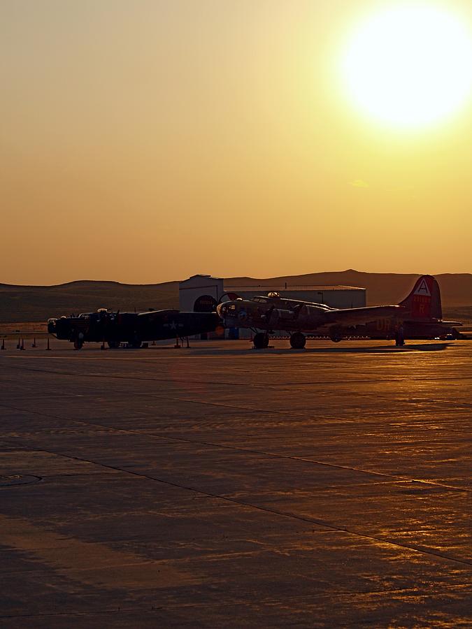 Flying Fortress at Sunset Photograph by Robert Lowe