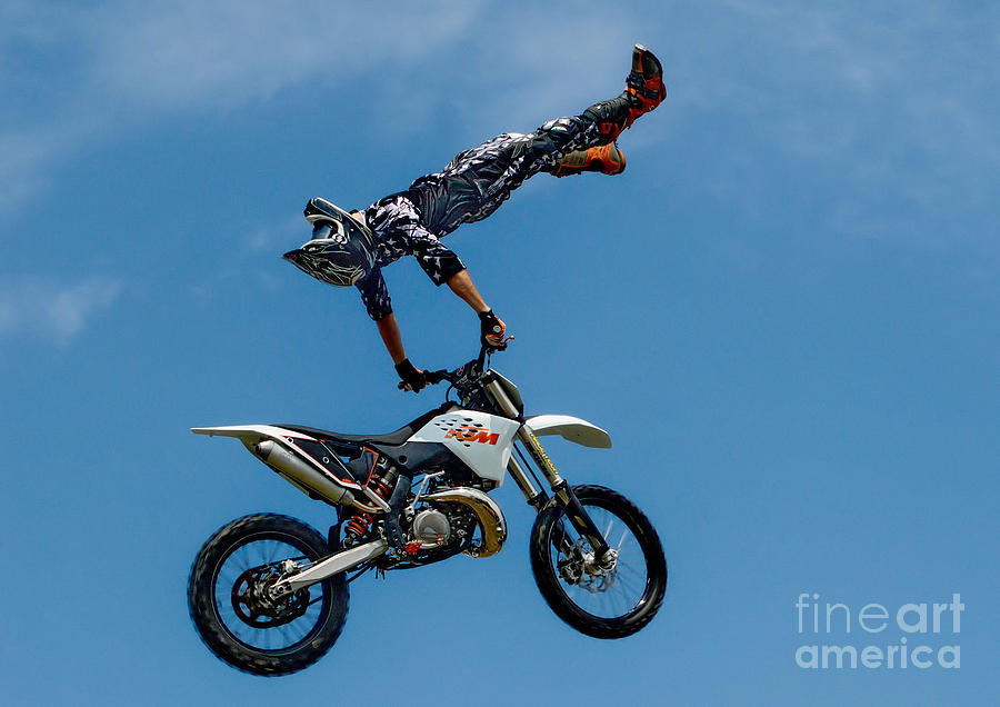 Flying High Motorcyle Tricks Photograph by Andrea Kollo