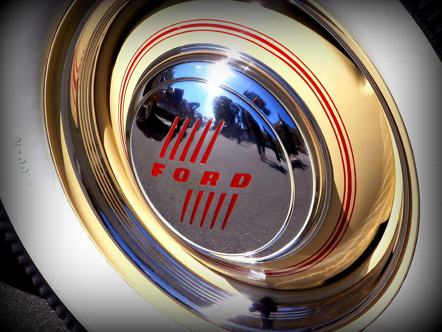 Ford Photograph - Ford Hubcap by Karyn Robinson