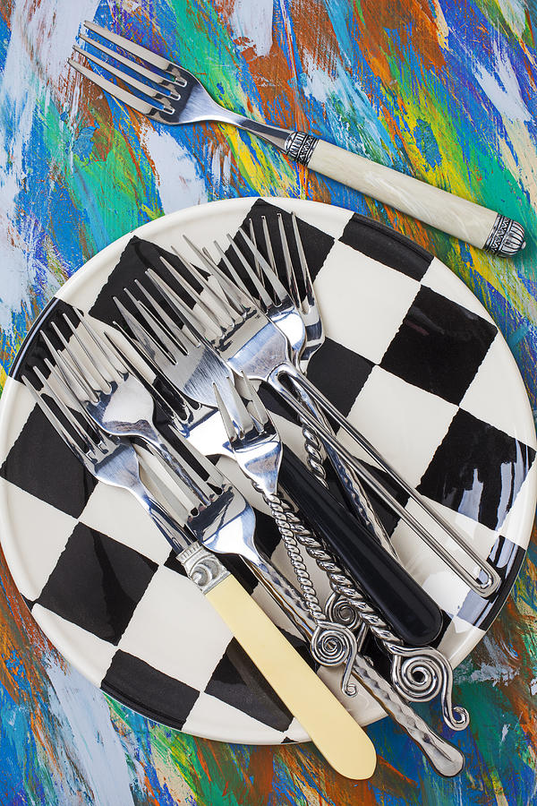 Forks on checker plate Photograph by Garry Gay