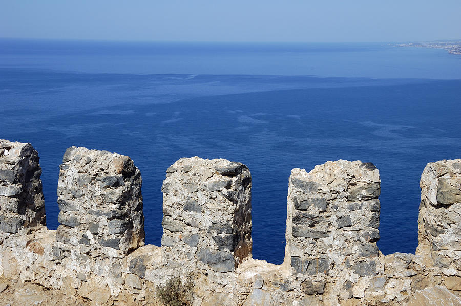 Fortification wall and blue ocean Photograph by Matthias Hauser