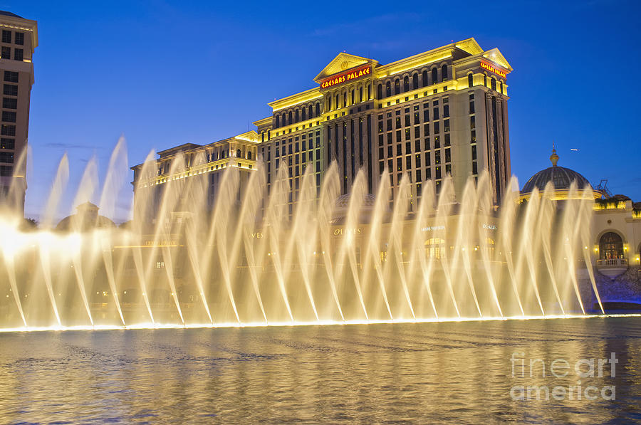 Las Vegas Photograph - Fountains of Bellagio in front of Caesars Palace Hotel and Casi by Andre Babiak