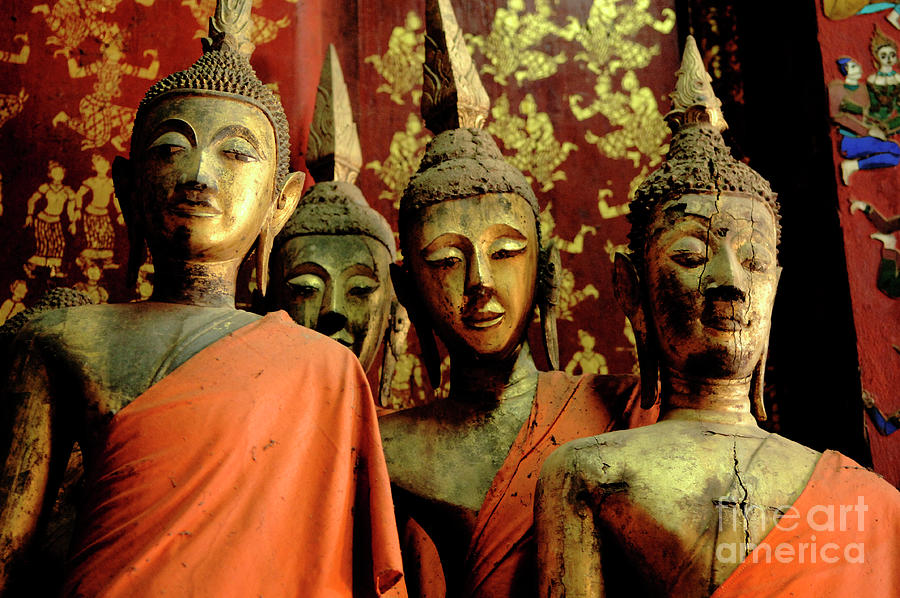 Four Buddhas Of Laos Photograph by Bob Christopher