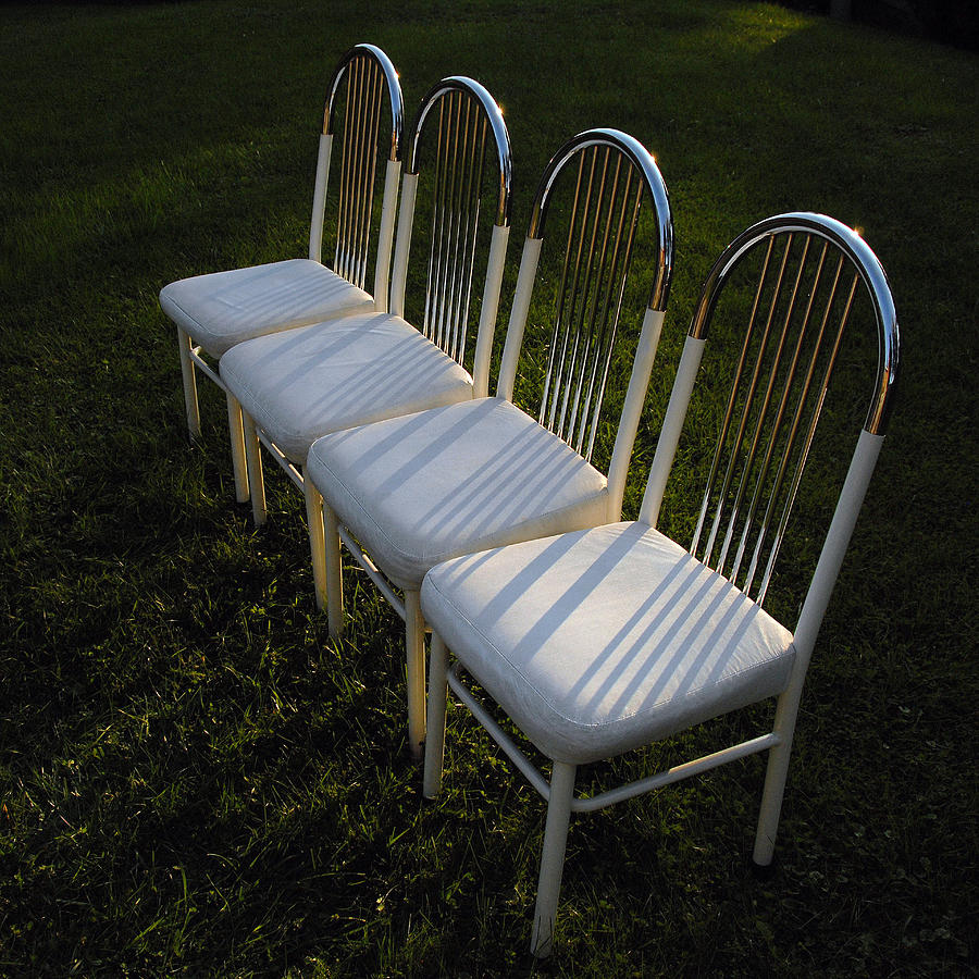 Four Chairs Photograph by Dragan Kudjerski