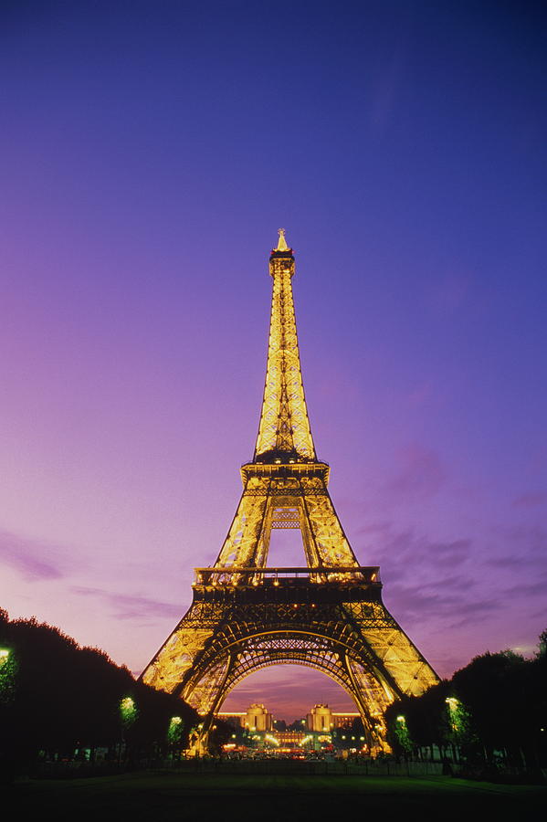 France,paris,eiffel Tower Illuminated At Dusk Photograph by Roger Wright