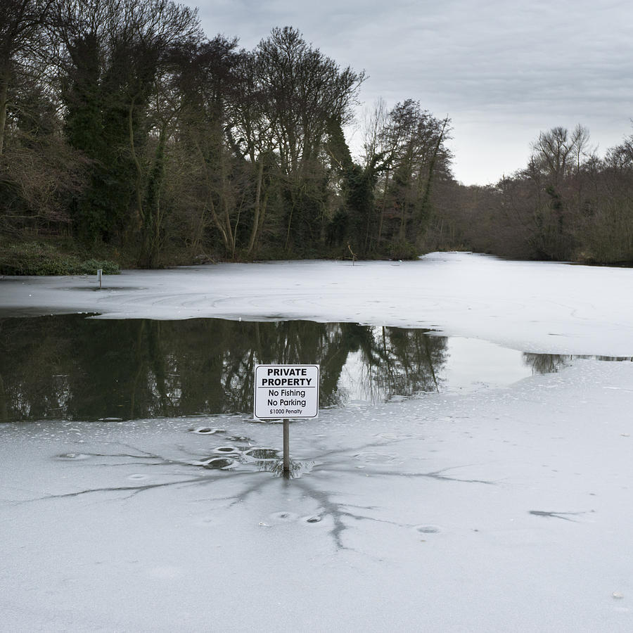 Frozen pond no parking Photograph by Gary Eason
