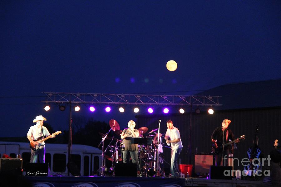 Full moon rising over the band Photograph by Yumi Johnson