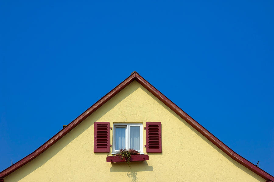 Gable of beautiful house in front of blue sky Photograph by Matthias Hauser