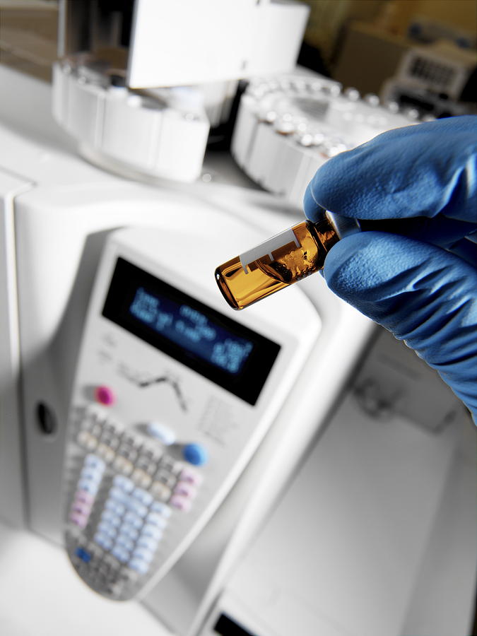 Bottle Photograph - Gas Chromatograph In A Chemistry Lab by Tek Image