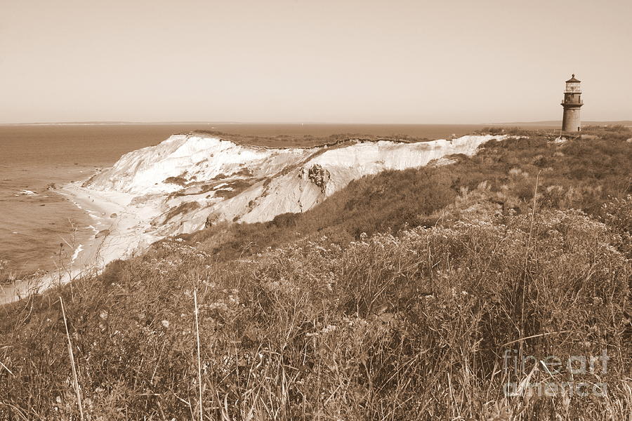 Gay Head Lighthouse with Aquinna Beach Cliffs - Sepia Photograph by Carol Groenen