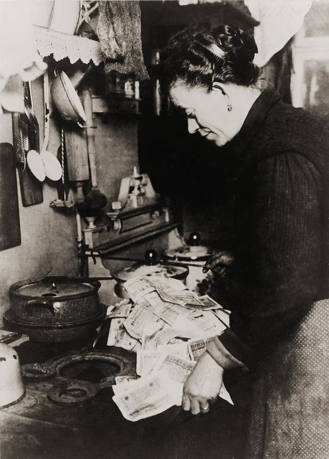 German Women Burning Money To Fuel Photograph By Everett 