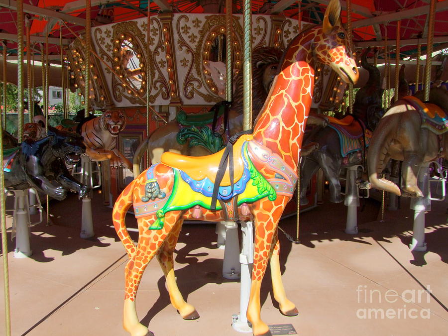 Animal Photograph - Giraffe Carousel Ride by Mary Deal