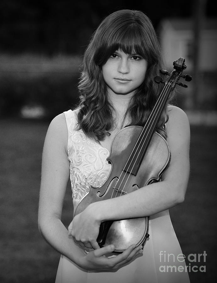 Girl Cradles Violin Photograph by Wayne Nielsen