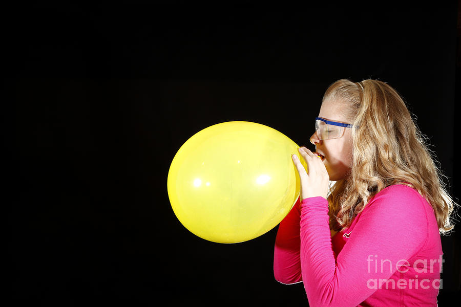 Girl Inflating Balloon Photograph By Ted Kinsman