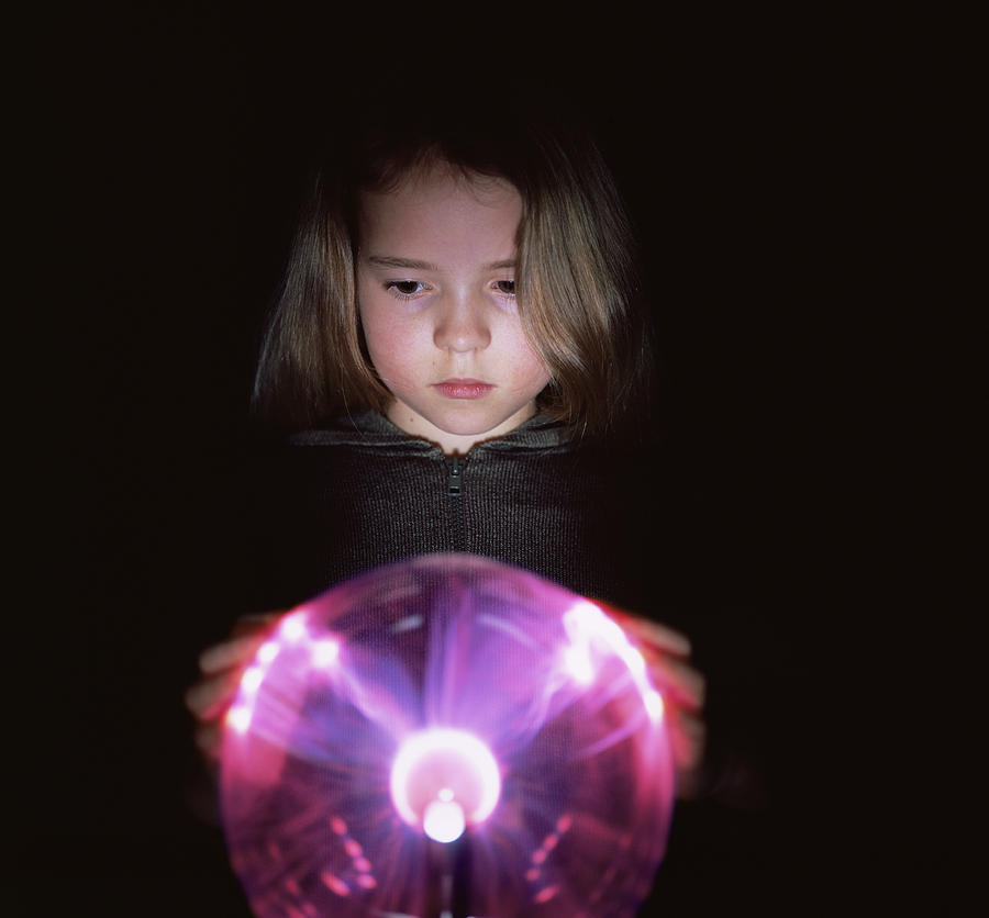 Globe Photograph - Girl Touching A Plasma Globe by Kevin Curtis