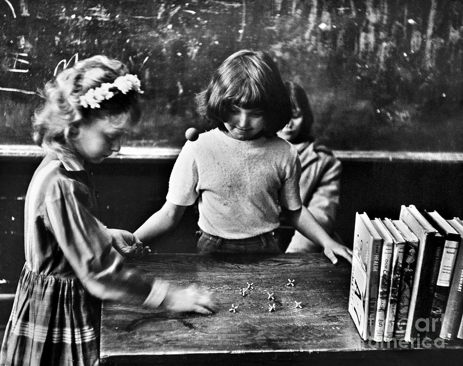 Girls Playing Jacks, 1964 Photograph by Granger