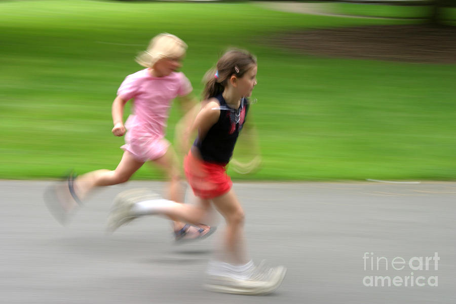 Girls Running Photograph by Ted Kinsman Girls Running Photograph by Ted Kinsman