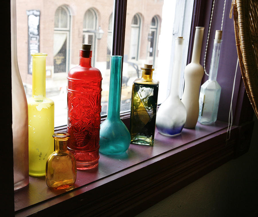 Glass Bottles in Window Photograph by Marilyn Hunt