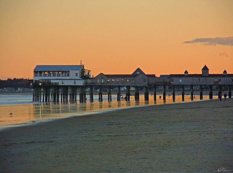 Glow at the Pier in Old Orchard Maine Photograph by Nancy Griswold
