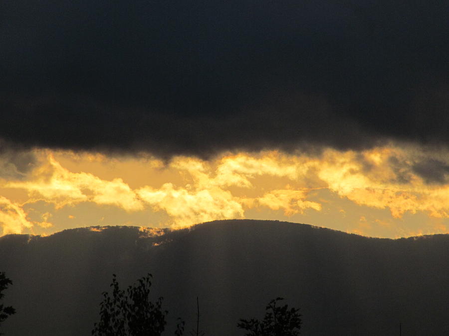 Glowing Sun Over the Hills Photograph by Loretta Pokorny